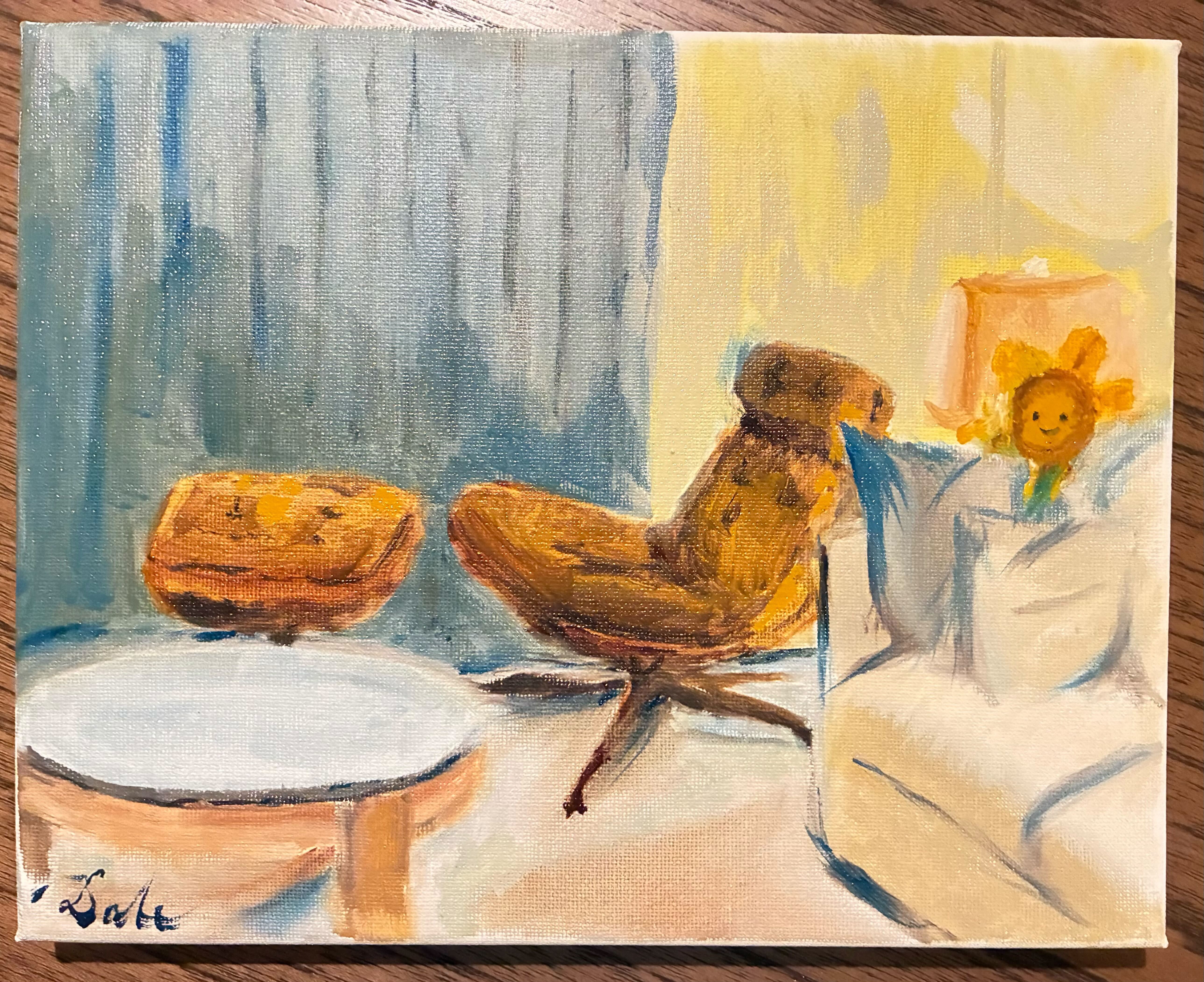 Leather chair and ottoman set against closed window, coffee table, lamp, and sofa also visible